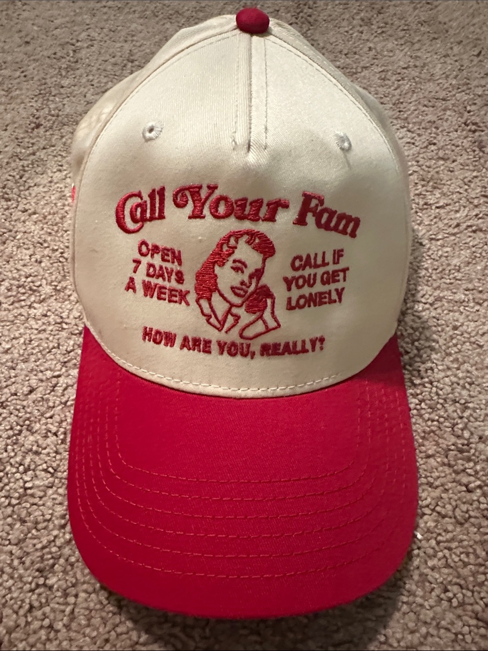 Cream and Red Embroidered "Call Your Fam" Trucker Hat